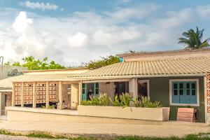 a house on the side of a street at EcoCharme Pousada Varandinha in Fernando de Noronha