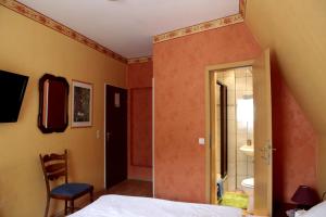Postel nebo postele na pokoji v ubytování Hotel Sessellift