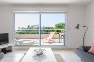 Balkon lub taras w obiekcie PGH N7- 100m de la Plage, Vue Mer & Parking Privé