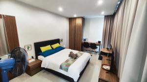 Postel nebo postele na pokoji v ubytování Comfy Studio Kuching + 37 fotografií