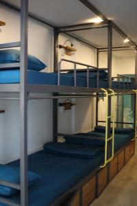 a group of bunk beds in a room at THE JOYS HOSTEL in Ho Chi Minh City