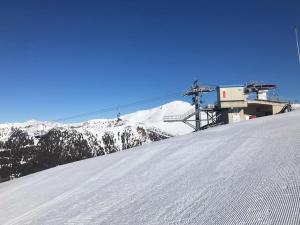 Gemütliches Bergappartement mit Seeblick during the winter