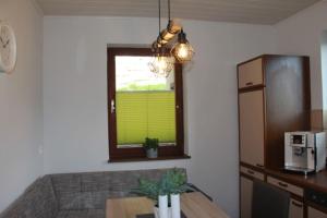 A kitchen or kitchenette at Gemütliches Bergappartement mit Seeblick