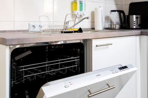 Kuchyň nebo kuchyňský kout v ubytování Modernisiertes Altbau 3-Zi Apartment
