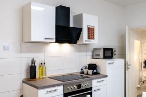 Kuchyň nebo kuchyňský kout v ubytování Modernisiertes Altbau 3-Zi Apartment