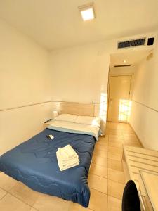 Krevet ili kreveti u jedinici u okviru objekta Hotel Como