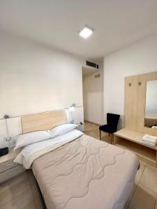 Krevet ili kreveti u jedinici u okviru objekta Hotel Como