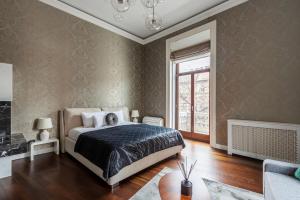 Posteľ alebo postele v izbe v ubytovaní Luxury Apartment With Balcony next to the New York Café