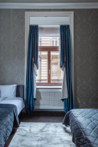 Posteľ alebo postele v izbe v ubytovaní Luxury Apartment With Balcony next to the New York Café