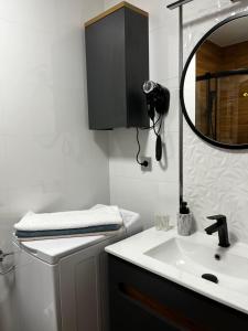 Kúpeľňa v ubytovaní Komfortowy Apartament w centrum + 11 fotografií