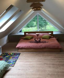 Postel nebo postele na pokoji v ubytování Apartmány Razová - Slezská Harta
