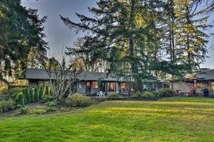 a house with a yard in front of it at Spacious Hillsboro Home about 18 Mi to Portland! in Hillsboro