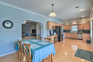 a dining room and kitchen with a table and chairs at Villa with Pool and Acreage about 10 Mi to Franklin 