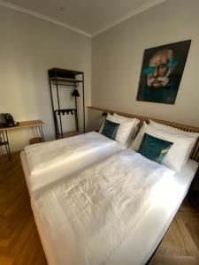 Postel nebo postele na pokoji v ubytování Boutique Hotel Kolbeck