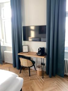 TV a/nebo společenská místnost v ubytování Boutique Hotel Kolbeck + 37 fotografií