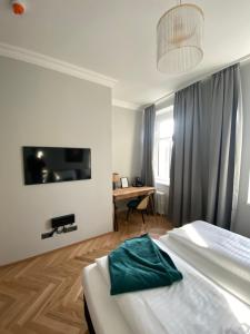 Postel nebo postele na pokoji v ubytování Boutique Hotel Kolbeck