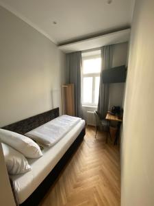 Postel nebo postele na pokoji v ubytování Boutique Hotel Kolbeck