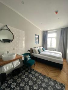 Postel nebo postele na pokoji v ubytování Boutique Hotel Kolbeck