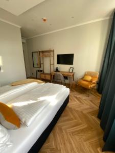 TV a/nebo společenská místnost v ubytování Boutique Hotel Kolbeck