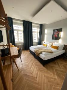 Postel nebo postele na pokoji v ubytování Boutique Hotel Kolbeck