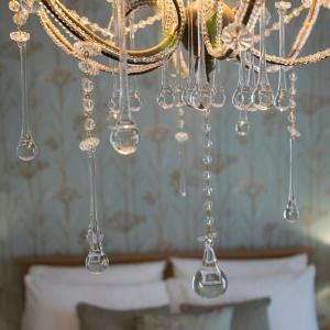 a chandelier hanging from a ceiling in a room at Rooftops in Louth
