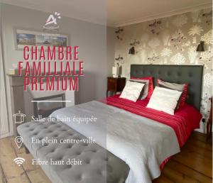 1 dormitorio con 1 cama con manta roja en Au coin du spa, en Boulogne-sur-Mer