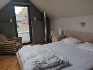 Postel nebo postele na pokoji v ubytování Villa Le Ti' Bauduin by Interhome