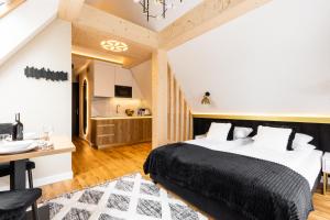 Posteľ alebo postele v izbe v ubytovaní Tatry Residence SPA