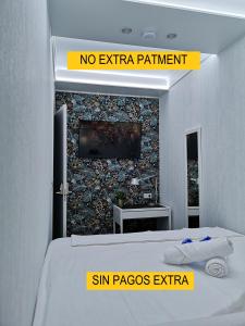 una señal que no lee ningún paciente extra en un dormitorio en Modular Rooms, en Madrid