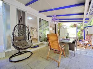 En terrasse eller udendørsområde på Holiday Home Villa ANiMa-Mia by Interhome