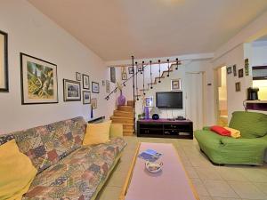 Et tv og/eller underholdning på Holiday Home Villa ANiMa-Mia by Interhome