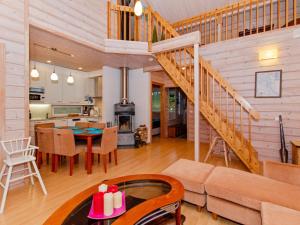 Posezení v ubytování Holiday Home Otsopirtti- otso by Interhome