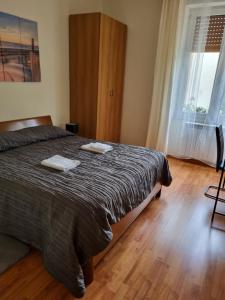 Postel nebo postele na pokoji v ubytování Alloggio Silva