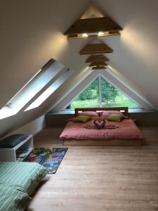 Postel nebo postele na pokoji v ubytování Apartmány Razová - Slezská Harta