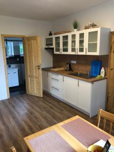 Kuchyň nebo kuchyňský kout v ubytování Apartmány Razová - Slezská Harta