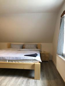 Postel nebo postele na pokoji v ubytování Apartmány Razová - Slezská Harta