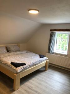 Postel nebo postele na pokoji v ubytování Apartmány Razová - Slezská Harta