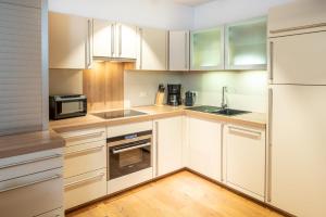 Eldhús eða eldhúskrókur á Kuckuck Hinterthal - Appartements