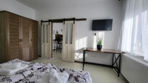 Posteľ alebo postele v izbe v ubytovaní Relax Apartments Sárvár A1
