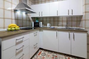 Kuchyňa alebo kuchynka v ubytovaní Reding 5 FreshApartments
