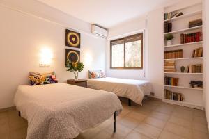 Posteľ alebo postele v izbe v ubytovaní Reding 5 FreshApartments