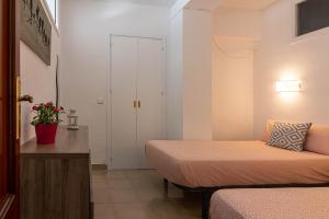 Posteľ alebo postele v izbe v ubytovaní Reding 5 FreshApartments