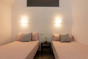 Posteľ alebo postele v izbe v ubytovaní Reding 5 FreshApartments