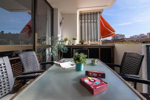 Balkón alebo terasa v ubytovaní Reding 5 FreshApartments