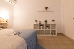 Posteľ alebo postele v izbe v ubytovaní Reding 5 FreshApartments