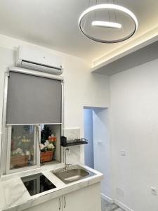 Kuchyňa alebo kuchynka v ubytovaní Sol Apartamentos Centro Histórico