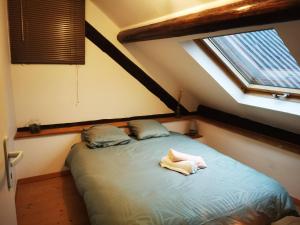 Ένα ή περισσότερα κρεβάτια σε δωμάτιο στο Appartement 4-6 personnes à proximité des stations et grands cols