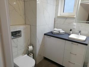 Kúpeľňa v ubytovaní Apartament MajaHouse