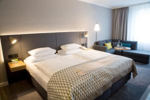 Postel nebo postele na pokoji v ubytování Holiday Inn Düsseldorf-Neuss by IHG