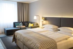 Postel nebo postele na pokoji v ubytování Holiday Inn Düsseldorf-Neuss by IHG